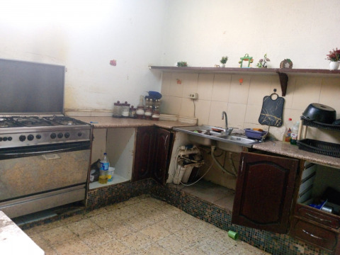 Areej, a mother of three, bears alone the responsibility of raising and supporting her children after her divorce