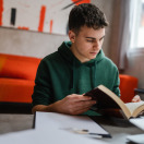 Ahmad is a young man battling cancer with a strong heart and determined to continue his studies despite pain and hardship